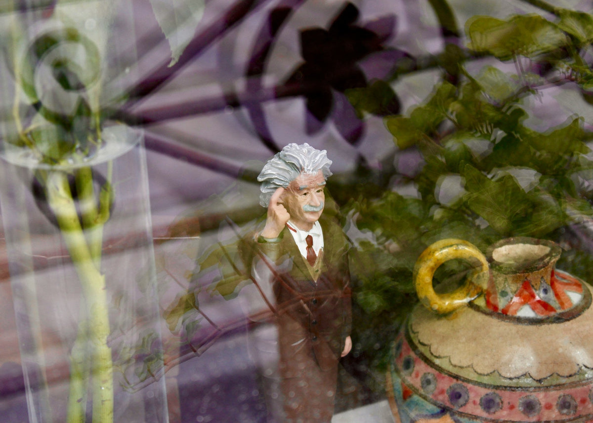 Einstein thinking of a foreign language with multilingual elements