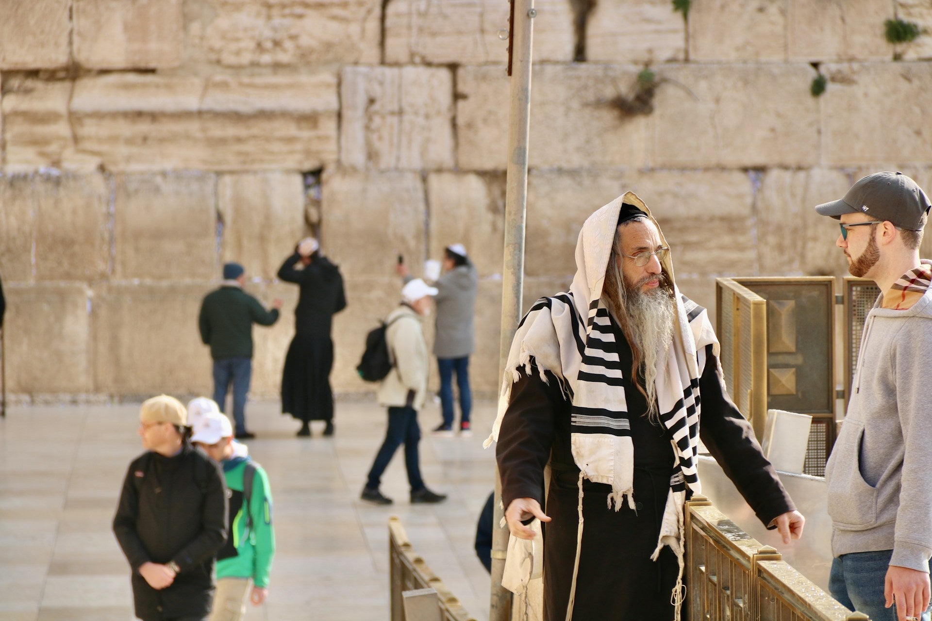 man teaching hebrew grammar to english speaker